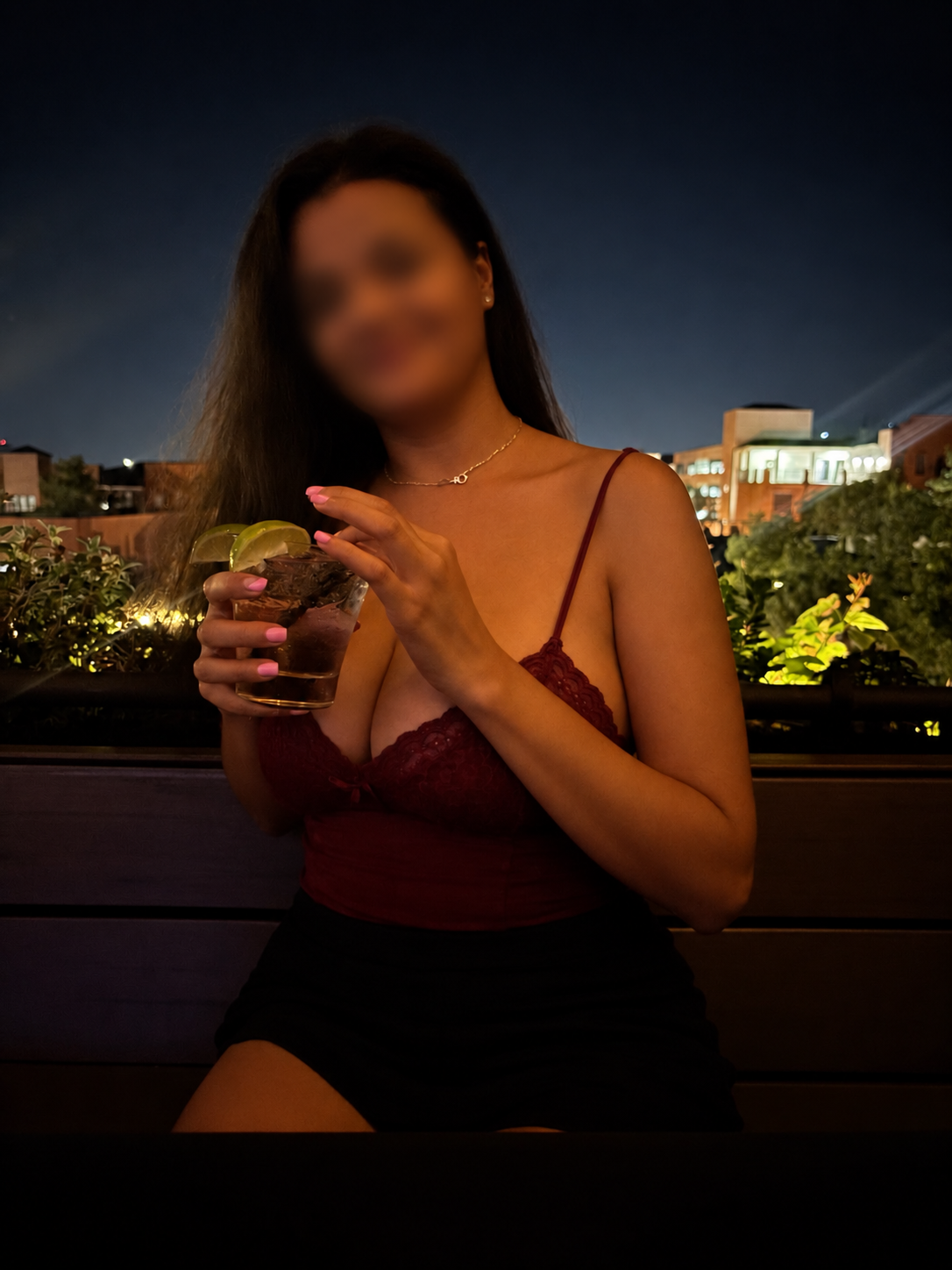 Devin enjoying a rooftop evening out